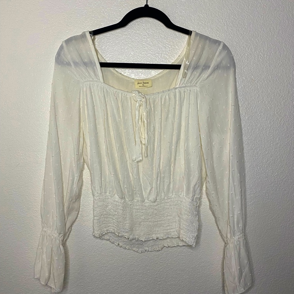White blouse with ruffles
